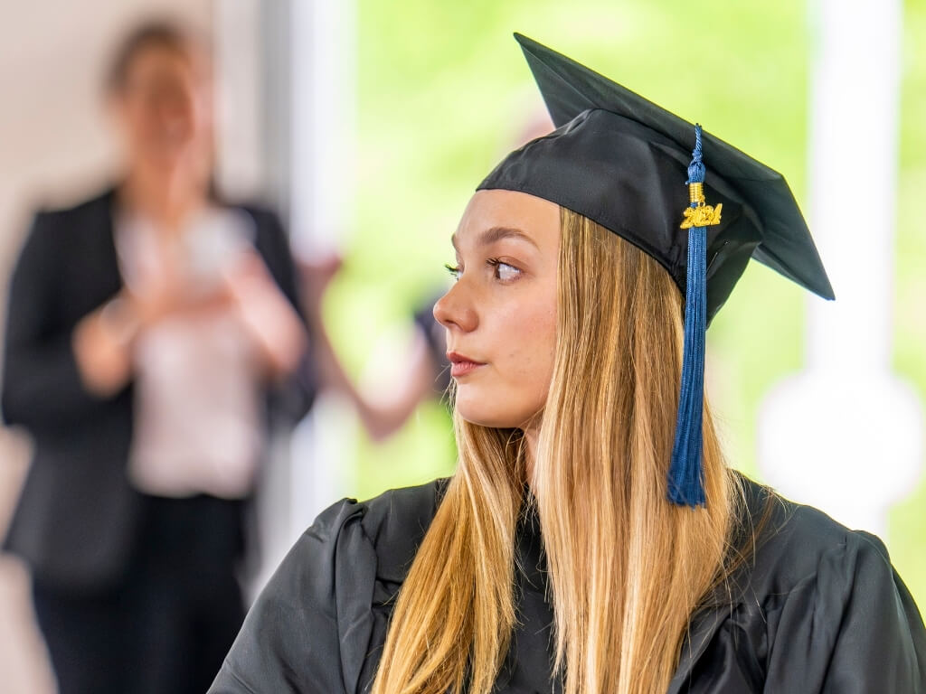 Stef in graduation cap and gown