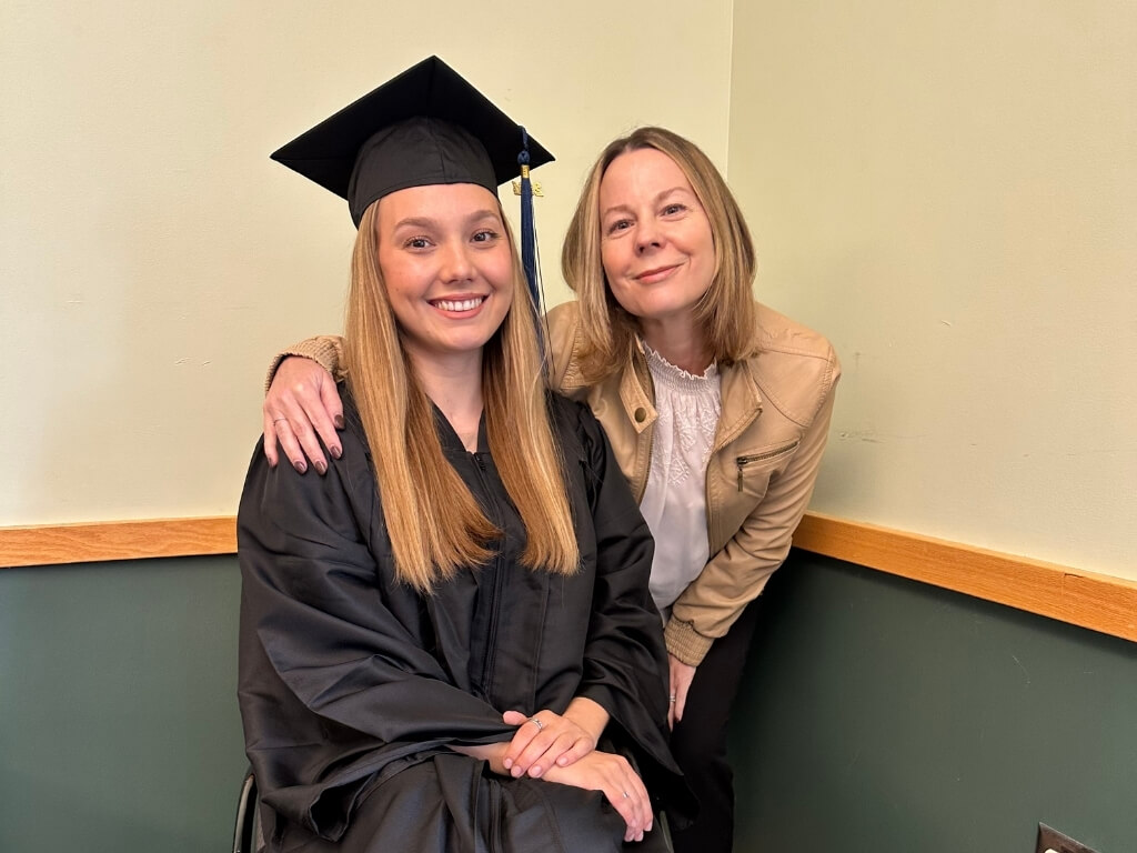 Stef in graduation cap and gown